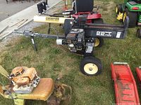 Side view showing engine, splitting beam, frame and wheels.