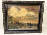 Framed oil painting showing complete landscape scene with river and cloudy sky