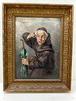 Frontal view of the painting showing the monk in brown robe holding a green umbrella, within an ornate gold frame.