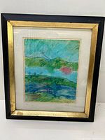 Framed painting showing the full artwork and condition including the black and gold frame and white mat with stains.