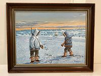 Full view of framed painting showing two Inuit hunters and a polar bear on snowy ice fields under sunset sky.