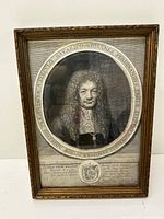 Full image of framed antique etching showing portrait of Ioannes Ferdinandus Fritzius with surrounding text and crest