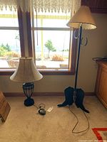 Floor lamp and table lamp placed side by side showing full height and bases