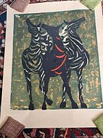 Full view of the vintage zebra print with three zebras featuring black, white, olive, and red colors on a green and gold textured background.