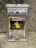 Front view of the 1997 Japanese Rocket Dark Raticate Pokémon card graded PSA 9 Mint housed in a PSA protective slab.