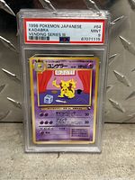 Photo of the 1998 Pokemon Japanese Kadabra card graded Mint 9 in PSA protective case, showing front artwork and details.