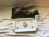 Two dishes on fabric background, showing both dishes fully with MaxSold lot card 35.