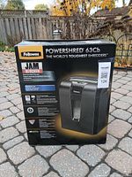 Box of Fellowes Powershred 63Cb showing model name and features including jam blocker and medium use capacity.