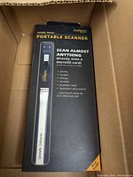 Photo of VuPoint Magic Wand Portable Scanner box with product description