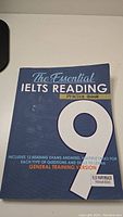 Paperback book titled 'The Essential IELTS Reading Practice Book 9' for IELTS General Training Reading practice.