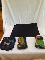 View of all placemats and three sets of napkins arranged on a white background.