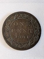 Obverse side of the 1901 Canada Large One Cent coin showing the denomination and date with vine leaf border.