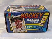 Box front showing hockey player in red jersey and 'Hockey Cards 1990 Complete Set of 264 Cards' text