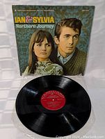 Vinyl LP record with red Vanguard label and front cover showing Ian and Sylvia's portrait against a green-blue patterned background.