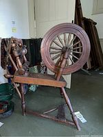 Full side view showing drive wheel, bench and legs