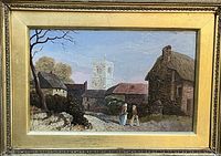 Closer view of the oil painting showing the village scene, including buildings, church tower, and two figures walking on path.
