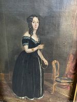 Close-up front view of painting showing subject’s face and upper body