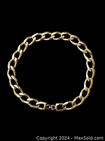 Full view of necklace on black background