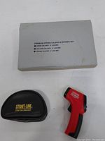 White case labeled Premium Spring Caliper & Divider Set with inside caliper, outside caliper, spring divider specs, Laser Level pouch, and red and black infrared thermometer handheld device
