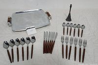 Full lot setup showing the tray, flatware, and decorative item