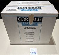 Closed box labeled Corelle Large Set Dinnerware by Corning