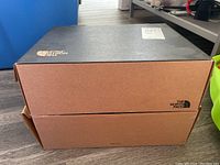 Box for The North Face boots closed, showing branding and label