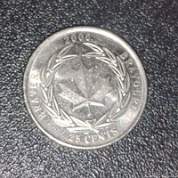 Reverse side showing 2006 Bravery maple leaf and laurel wreath design with denomination