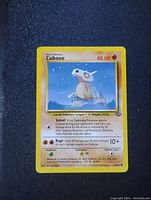 Front view of an original Cubone Jungle set Pokemon card showing the artwork, attacks, and card details.