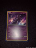 Clear image of a Mewtwo holographic Pokemon card showing the character, stats, and holo foil effects.