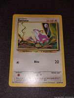 Photo of Rattata Original Base Set Pokemon card with visible text, artwork, and condition details.