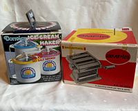 Photo of both Donvier Ice Cream Maker and Ampia Pasta Maker in original boxes