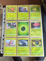 Pokemon cards organized in binder pages showing various cards including Paras, Lileep, Weepinbell, Cacturne, Vileplume, Volbeat, Heracross, Pineco