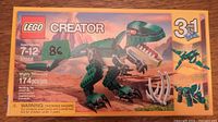Front of the sealed LEGO Creator 3-in-1 Mighty Dinosaurs set 31058 box showing single T-Rex build and set details.