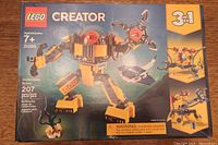 Front of the sealed Lego Creator 31090 Underwater Robot box showing the main underwater robot model and branding.