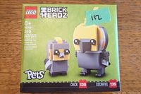 Front of sealed LEGO BrickHeadz 40481 box showing the cockatiel and chick models, age recommendation, piece count, and BrickHeadz branding.