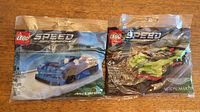 Photo showing both sealed LEGO Speed Champions sets together: McLaren Elva 30343 and Aston Martin Valkyrie 30434, clearly showing packaging and branding
