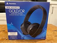 Front of box showing PlayStation Gold Wireless Headset image and product name.