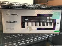 Original packaging box showing the Arturia KeyLab 49 Black Edition controller
