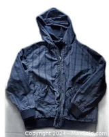 Front view of the men's vintage reversible hoodie in blue crosshatch pattern with zipper and hood.