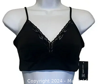 Front view of the black lace-trim bralette displayed on mannequin showing the deep V neckline and floral lace trim with tag visible.