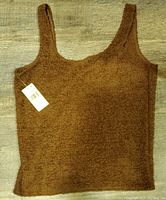 Front view of the brown chenille sleeveless scoop-neck top with tag attached, laid flat on wood floor.