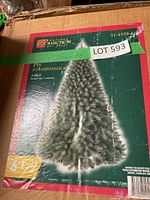 Box of Holiday Collection Pin d'Adirondack artificial Christmas tree showing tree image and branding