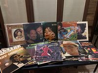 Photo of front covers of vinyl records showing a variety of artists in blues, jazz, country, R&B, and classic soul genres.