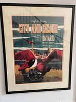Framed City and Colour 2016 tour poster depicting graphic red bird and cityscape.