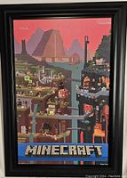 Framed Minecraft textured poster featuring blocky landscapes and characters, measured 48x28.5 inches in good condition.