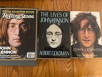 Photo of three hardcover John Lennon books, showing covers and titles clearly.