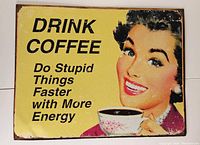 Photo of a rectangular metal tin sign with yellow background, black text, and a vintage illustration of a woman holding a cup of coffee.