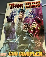 Front cover of the Thor Iron Man comic book with title 'God Complex' showing Thor, Iron Man, and another character.