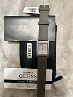 Guess watch front dial with original GUESS case and Canada warranty card