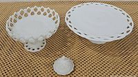 Photo of the set including pedestal compote bowl, cake stand and quilt milk glass dish